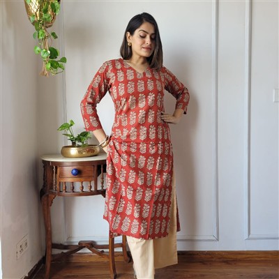 Rustic Orange Leaf Motif Cotton Ensemble with Cream Pants