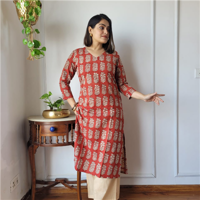 Rustic Orange Leaf Motif Cotton Ensemble with Cream Pants