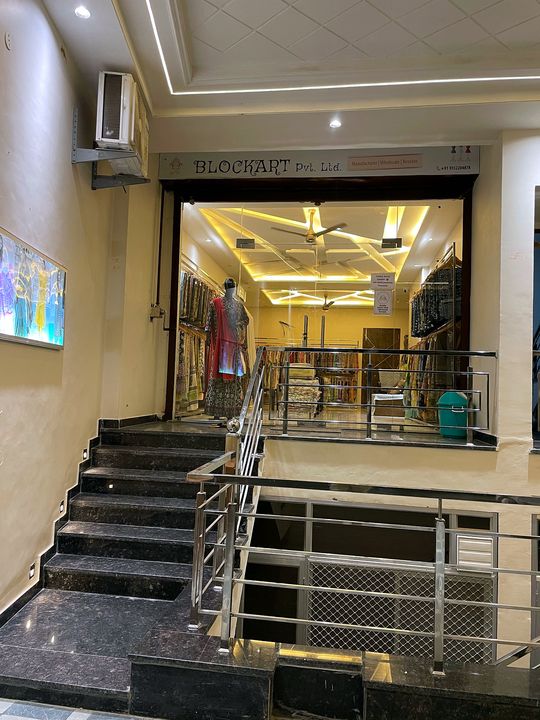 Blockart Pvt. Ltd. store front on New Sanganer Road, Sodala, Jaipur, lit up in the evening